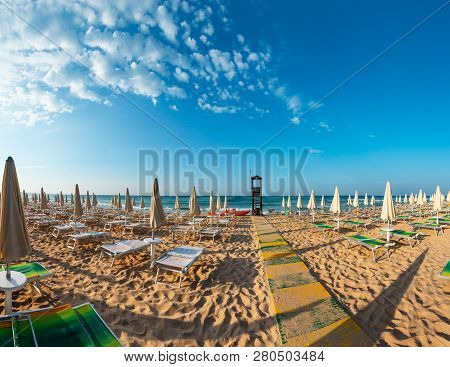 Morning Paradise White Sandy Beach The Maldives Of Salento With Sunshades And Sunbeds (pescoluse, Sa