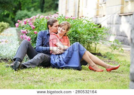 Pretty Love Couple Walking In The Summer Park