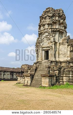 The Ogival, Redented Tower Shaped Like Lotus Bud Of Angkor Wat, And The Very Steep Stairways Represe
