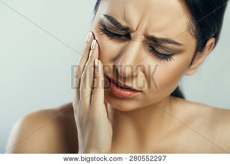 Tired Neck. Beautiful Young Woman Suffering From Neck Pain. Attractive Female Feeling Tired, Exhaust