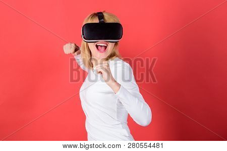 Portrait Of Young Woman Wearing Vr Goggles, Experiencing Virtual Reality Using 3d Headset. Person Wi
