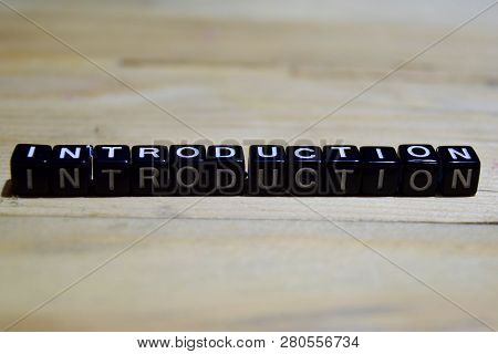 Introduction Message Written On Wooden Blocks. Education And Motivation Concepts. Cross Processed Im