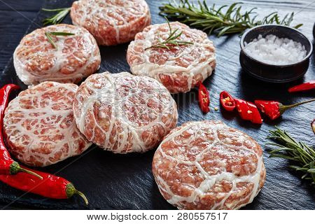 Raw Atriaux - Ground Pork Wrapped In Caul Fat, Swiss Cuisine, Type Of Bratwurst, Burgers On A Slate 
