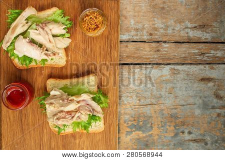 Sandwich With Chicken And Lettuce. Food Background. Copy Space