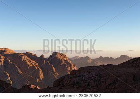 Scenic Rocky Peaks Against A Blue Sky. Mount Sinai (mount Horeb, Gabal Musa). Sinai Peninsula Of Egy