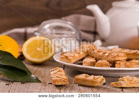 Puff Pastry Cookies With Jam On White Dish.