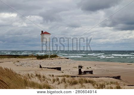 Stormy Lake Michigan Landscape. Windswept Beach And Waves On The Lake Michigan Coast With Remote Wat