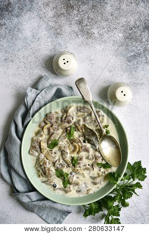 Beef Stroganoff - Meat Stewed In Cream Sauce With Mushrooms.top View With Copy Space.