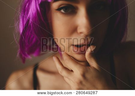 Beautiful Woman With Beauty Face Applying Lip Balsam, Lipbalm On Full Sexy Lips. Portrait Of Sexy Fe