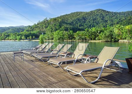 Beach Chair With Island Background, Koh Chang, Trad Province, Thailand.