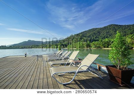 Beach Chair With Island Background, Koh Chang, Trad Province, Thailand.