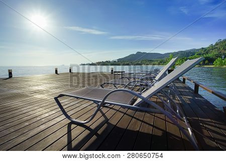 Beach Chair With Island Background, Koh Chang, Trad Province, Thailand.