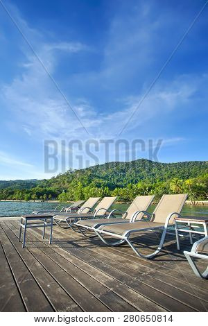 Beach Chair With Island Background, Koh Chang, Trad Province, Thailand.