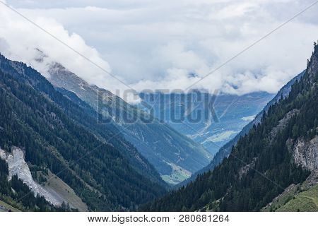 Mountains, Peaks, Lake, Everlasting Ice And Trees Landscape. Kaunertaler Gletscher Natural Environme