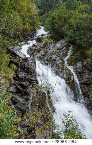Mountain River And Trees Landscape. Kaunertaler Gletscher Natural Environment. Hiking In The Alps, K
