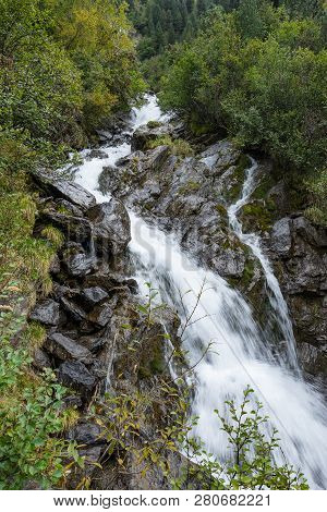 Mountain River And Trees Landscape. Kaunertaler Gletscher Natural Environment. Hiking In The Alps, K