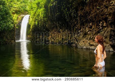 Young Woman In Bikini Standing At Wainibau Waterfall On Taveuni Island, Fiji. Taveuni Is The Third L