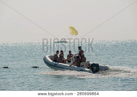 Turkler, Turkey - August 3, 2018: Water Sports Area On The Senza Hotel Beach. Tourists Trip On Medit