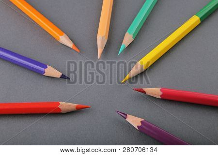 Set Of Colored Pencils. Gray Background. Different Colours.