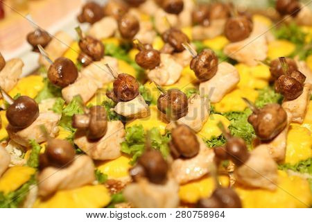 Canape With Chicken And Mushrooms. Snack Of Bread, Mushrooms And Skew Merciless