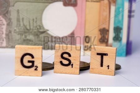 Concept Of Gst With Indian Currency On Isolated Background