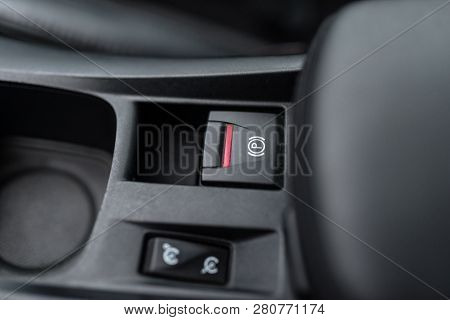 Black Interior Of A Modern Car, Switch On The Electrically Assisted Parking Brake, Handbrake.
