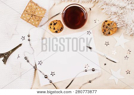 Mockup With A Cup Of Tea, Cookies With Chipped Chocolade, Card And Pen For Writing And Little Eiffel