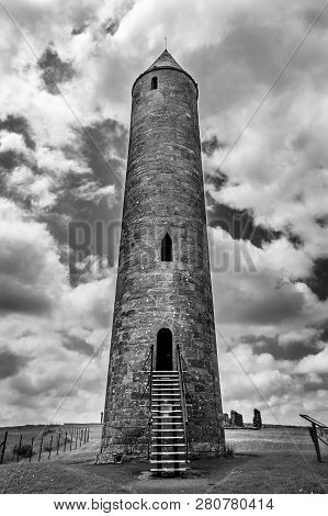 This Is A Picture Of The Old Monastic Round Tower On Devenish Island In County Fermanagh, Ireland.  