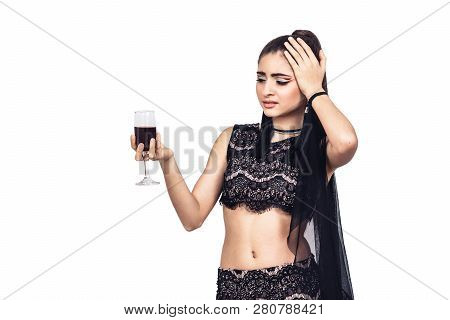 A Beautiful Young Girl Has A Headache From Wine. Isolated On White