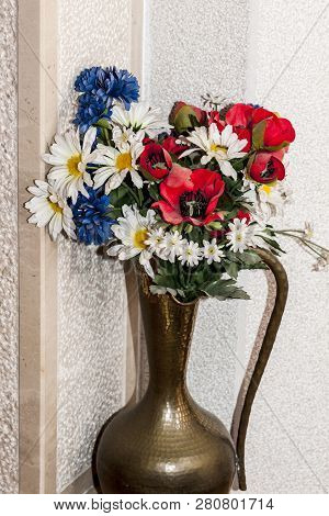 Colorful Flowers In A Brass Caraff At Home - Photograph