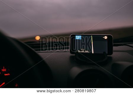 Night Road In The Car Navigator On The Phone