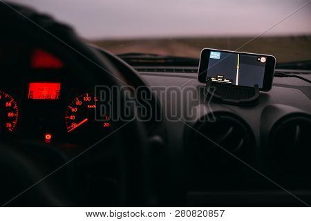 Night Road In The Car Navigator On The Phone
