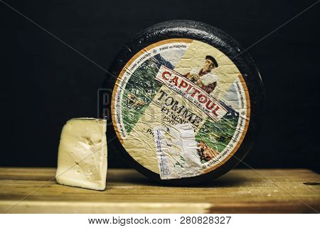 Belgrade, Serbia - November 22, 2018: Detail Of Tomme Des Pyrenees Cheese In Belgrade, Serbia. Tomme