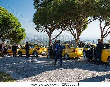 Pergamum, Turkey - October 06, 2018: Taxi Waiting For The Passengers Or Tourists At The Outside Area