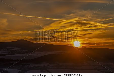 Sunrise On Boren Hill Near Bilina Town In Winter Frosty Color Morning