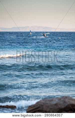 A Surfers Rides In The Gulf Of Aqaba In The Red Sea View From The Dahab Embankment