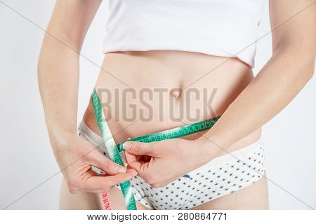 Woman Body After Weight Loss. Cropped Close Up Photo Of Fatless Slender Body Parts And Proportions W