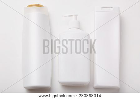 Horiontal Shot Of Plastic Bottles With Beauty Products, Empty Space For Your Design. Body Care Produ