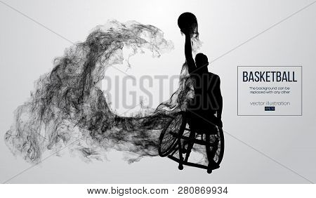 Abstract Silhouette Of A Basketball Player Disabled On White Background From Particles, Dust, Smoke,
