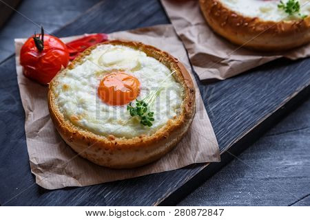 Buns With Melted Cheese And Yolks, Dark Photo