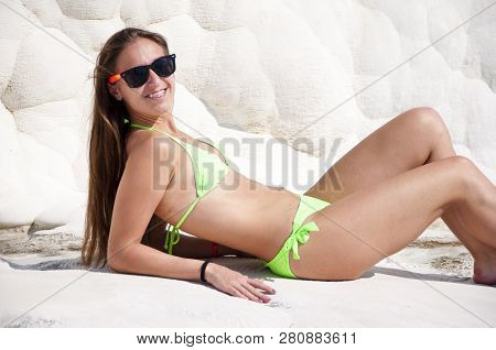 Spa Girl. Sexy Woman With Fit Suntan Body. Natural Travertine Pool Terrace In Pamukkale. Summer Vaca