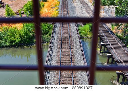 Views Of Jordan River Trail Pedestrian And Train Track Bridge With Surrounding Trees, Russian Olive,