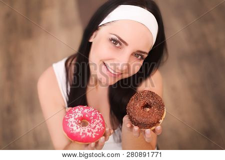 Beauty Fashion Model Girl Taking Sweets And Colorful Donuts. Funny Joyful Styled Woman With Sweets O