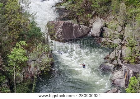 Kayakers Paddle Over Rapids Below Toccoa Falls