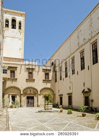 Sunny Courtyard At The Historic Former Convent That Now Houses The State Archives Of Palermo, Sicily
