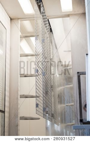 Powder Coating Line. Camera Painting Products In An Electrostatic Field.