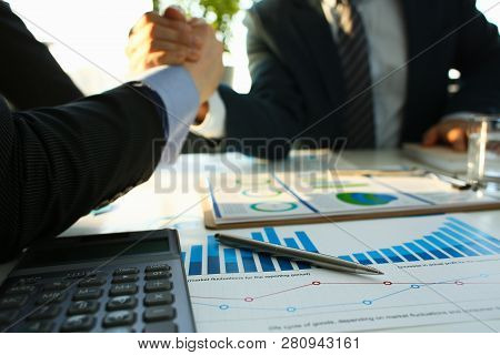 Businessman In Sut Hand Shake In Ofiice Closeup. Introduce Manager Job Man Risk Chart Paper How Deal