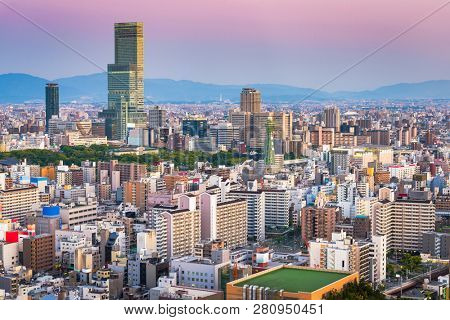 Osaka, Japan city skyline in the Abeno District at dusk.