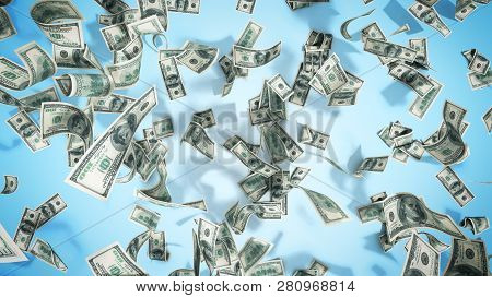 Hundred Dollar Banknotes Fall On Graund On Blue Background