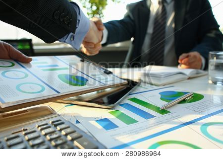 Businessman In Sut Hand Shake In Ofiice Closeup. Introduce Manager Job Man Risk Chart Paper How Deal